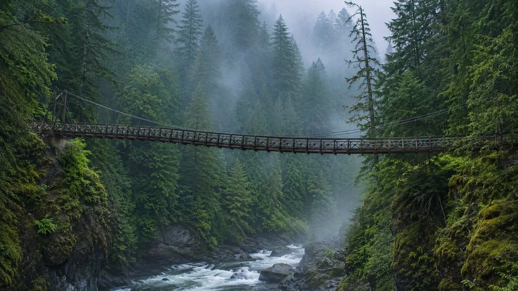 Looking along the deck of the Capilano Suspension Bridge, 70 m above the river